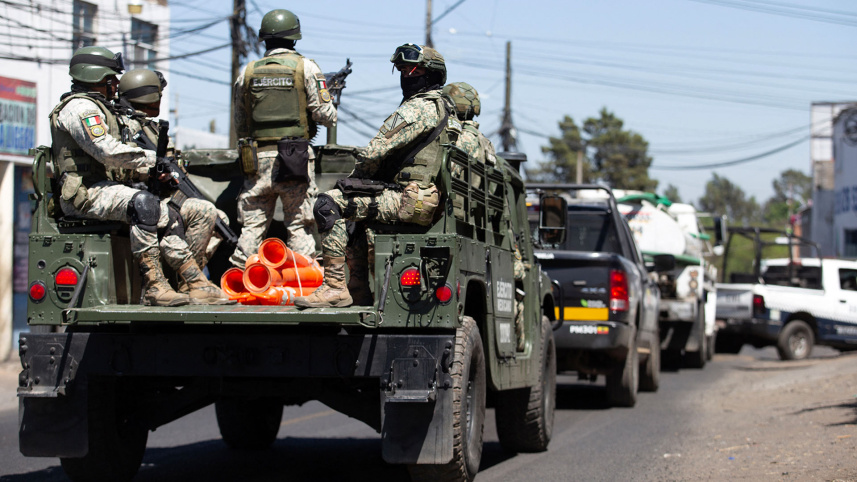 Members of the Mexican Army patrol the Morelia–Patzcuaro Highway
