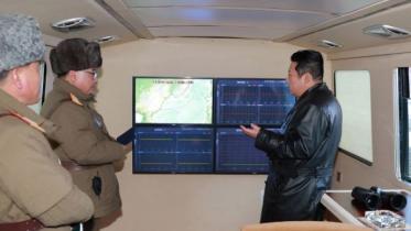 kim_and_north_korea_missile.jpg