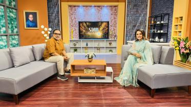 খলনায়ক মিশা সওদাগরের সঙ্গে উপস্থাপিকা। ছবি: সংগৃহীত