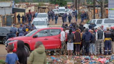 afp_20251221_88rd3xc_v1_midres_safricacrimeshooting.jpg